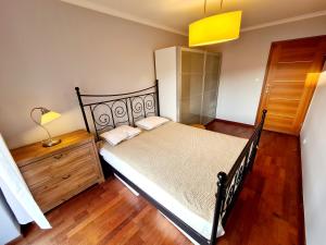 Postel nebo postele na pokoji v ubytování Na Bukowej Apartament Widokowy z dużym tarasem