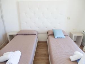 Postel nebo postele na pokoji v ubytování Riviera Mare Beach Life Hotel