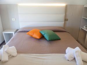Postel nebo postele na pokoji v ubytování Riviera Mare Beach Life Hotel