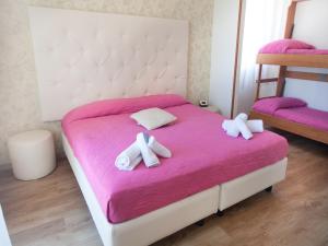 Postel nebo postele na pokoji v ubytování Riviera Mare Beach Life Hotel