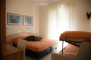 Postel nebo postele na pokoji v ubytování Riviera Mare Beach Life Hotel