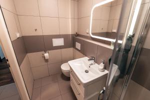 Kúpeľňa v ubytovaní Apartmány CAFÉ-CAFÉ
