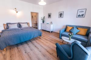 Posteľ alebo postele v izbe v ubytovaní Apartmány CAFÉ-CAFÉ