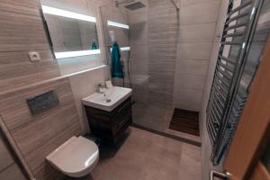 Kúpeľňa v ubytovaní Apartmány CAFÉ-CAFÉ