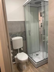 Ένα μπάνιο στο Domus La Foce Hotel