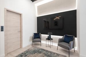 Posedenie v ubytovaní Holló 3 Bedroom Downtown Apartment