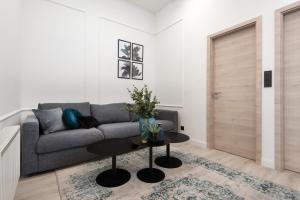 Posedenie v ubytovaní Holló 3 Bedroom Downtown Apartment