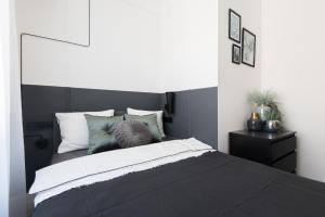 Posteľ alebo postele v izbe v ubytovaní Holló 3 Bedroom Downtown Apartment