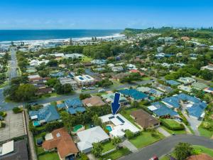 an aerial view of a suburb with houses and the beach at Frangipani Hideaway in Lennox Head