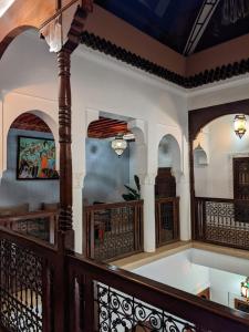 a house with a staircase and a bath tub at Riad Smara in Marrakesh