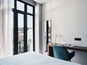 Ein Bett oder Betten in einem Zimmer der Unterkunft Athens City View Urban Suites