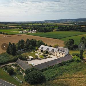 an aerial view of a large house in a field at Ty Gorre Ker Studio Rooms in Cast