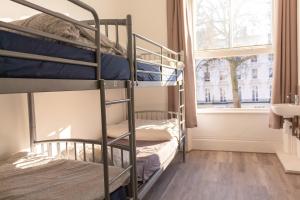 Postel nebo postele na pokoji v ubytování Urbany Hostel London 18-40 Years Old