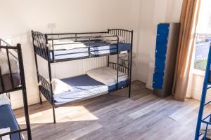 Postel nebo postele na pokoji v ubytování Urbany Hostel London 18-40 Years Old
