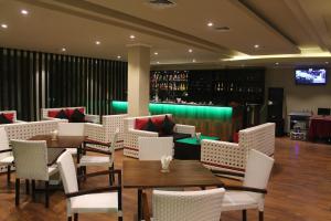 Uma área de estar em Novo Turismo Resort & Spa