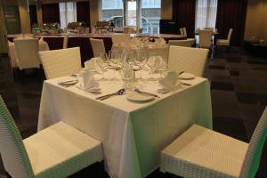 Um restaurante ou outro lugar para comer em Novo Turismo Resort & Spa