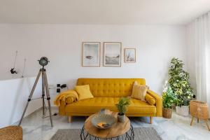 A seating area at Eco Playa Suites - Beach & Golf!