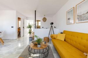 A seating area at Eco Playa Suites - Beach & Golf!