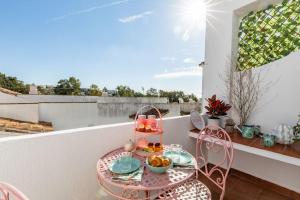 A balcony or terrace at Eco Playa Suites - Beach & Golf!