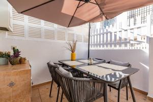 A balcony or terrace at Eco Playa Suites - Beach & Golf!