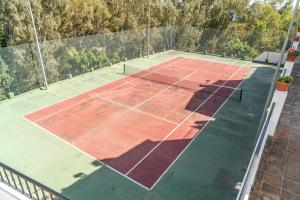 Tennis and/or squash facilities at Eco Playa Suites - Beach & Golf! or nearby