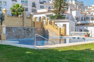 The swimming pool at or close to Eco Playa Suites - Beach & Golf!