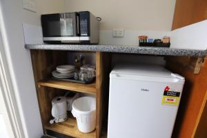 Kuchyň nebo kuchyňský kout v ubytování Citigate Motel Newcastle