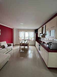 Kuchyň nebo kuchyňský kout v ubytování Apartamentos María de Lucía - Piso B
