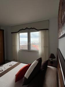 Postel nebo postele na pokoji v ubytování Apartamentos María de Lucía - Piso B