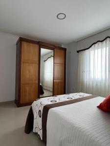 Postel nebo postele na pokoji v ubytování Apartamentos María de Lucía - Piso B