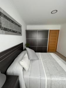 Postel nebo postele na pokoji v ubytování Apartamentos María de Lucía - Piso B