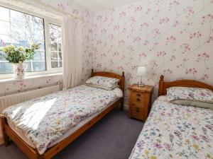 Katil atau katil-katil dalam bilik di Lower Lane House