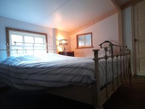 A bed or beds in a room at Kerckhoeve