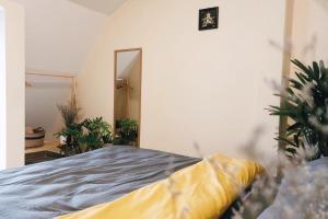 Postel nebo postele na pokoji v ubytování Be.Ho DaLat - Attic