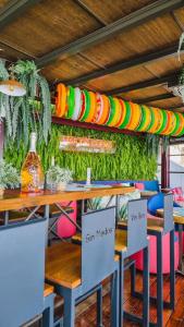 A restaurant or other place to eat at Eco Playa Suites - Beach & Golf!
