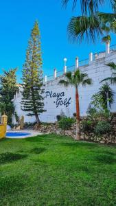 A garden outside Eco Playa Suites - Beach & Golf!
