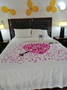 Una cama o camas en una habitación de Ensenada Resort