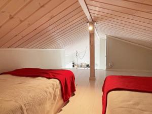 Postel nebo postele na pokoji v ubytování Holiday home Höviksnäs VII