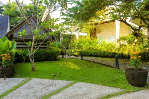 Zahrada ubytování Chanteak Bali - Stone House 2