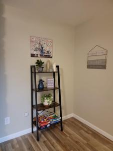 a shelf in the corner of a room at Just Breathe in Dandridge