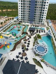 Kolam renang di atau dekat dengan Apartamento Salinas Premium Resort 15º andar - Salinópolis