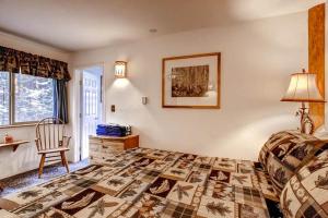 Letto o letti in una camera di Alpine View
