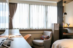 Postelja oz. postelje v sobi nastanitve Wonstar Hotel