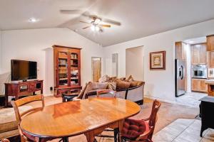 a living room with a table and a couch at Eagles Nest in Yosemite West