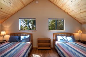 Posteľ alebo postele v izbe v ubytovaní Sierra Base Camp