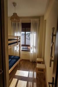 Posteľ alebo postele v izbe v ubytovaní Casas Rurales Pantano de La Minilla