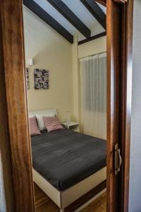 Posteľ alebo postele v izbe v ubytovaní Casas Rurales Pantano de La Minilla
