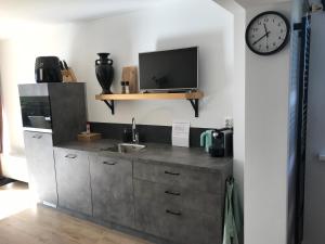 Kuchyň nebo kuchyňský kout v ubytování B&B de Danser