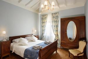 Posteľ alebo postele v izbe v ubytovaní Tuscan farmhouse with spectacular views + 9 fotografií