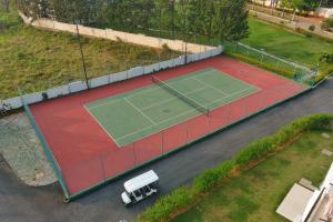 Tenis a/nebo squash v ubytování Spree Resort At Century Wintersun nebo okolí